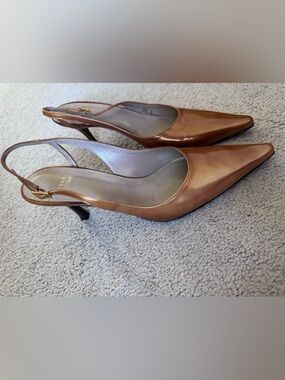 Stuart Weitzman Patent Leather Slingback Pumps in Cognac